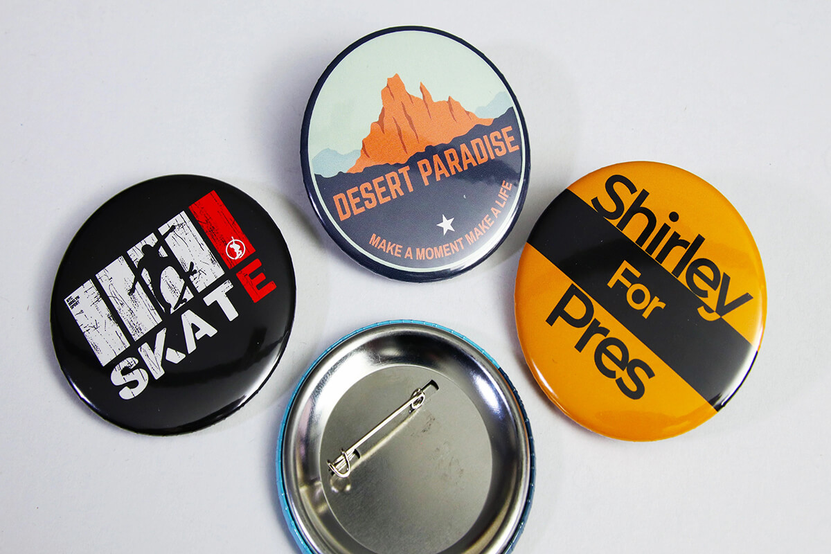 Enamel Pins VS. Button Pins